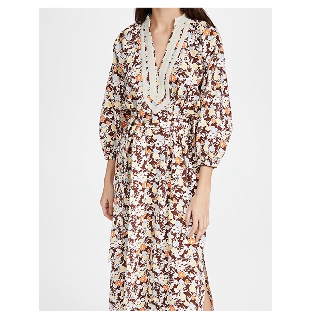 Brand new with tags Tory Burch caftan can be worn belted or lose fit